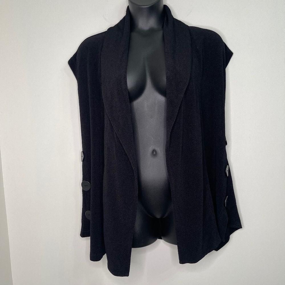 Timeless Black Sleeveless Vest with Button Detailing
